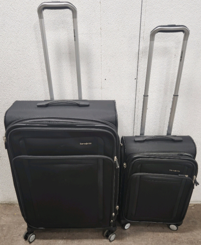 (2) Samsonite Suit Cases