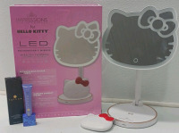 Hello Kitty LED Rechargeable Mirror With Cimpact Mirror And Tatcha Luminous Eye Serum