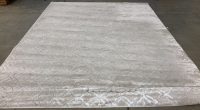 7’10” x 10’ Cream Area Rug