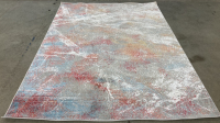 5’1” x 7’ Multicolor Area Rug