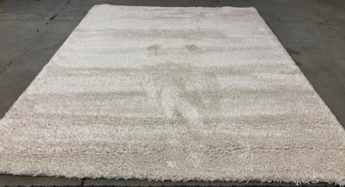 7’10” x 10’ Cream Shag Area Rug