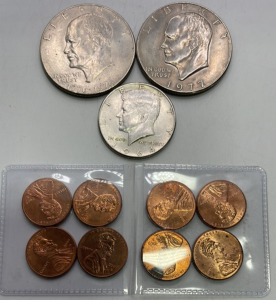 (1) 1776-1976 Eisenhower Dollar, (1) 1977 Eisenhower Dollar, 1964 Kennedy Half Dollar, (8) 2009 Lincoln Cents W/ Commemorative Backs