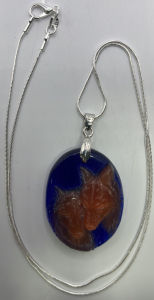 (1) 126.10ct. Carved Red/Blue Cats Eye Agate Double Wolf Head Silver .925 Necklace