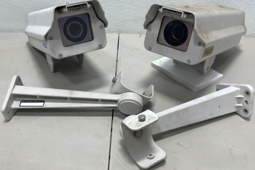 (2) Pelco Outdoor Surveillance Cameras W/ Mouting Arms