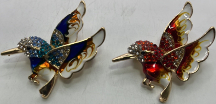 (1) Blue And White Hummingbird Pin, (1) Red And White Hummingbird Pin