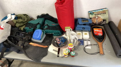 Tote With Sleeping Bag, Fishing Net, Loon Fly Box, and More