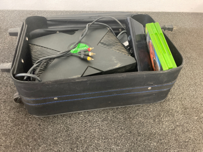 Suitcase with x box & Xbox 360 accessories