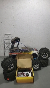 Traxxas Electric RC Truck with Set of Spare Wheels, Charger and Battery