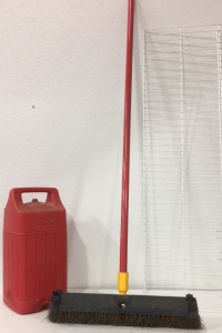 (1) large red broom, (1) red gasoline jug, (1) large white metal rack