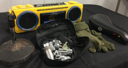 Battery Powered Boom Box. Microphone Stand With Cast Iron Base. Pouch Of Sockets and Bolts. Gloves. SS X Wilderness Trail Bikes Bike Seat.
