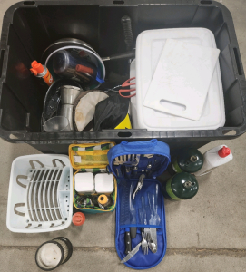 Black Tub Full Of Camping Supplies