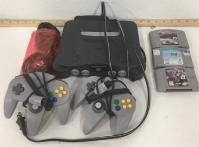 (1) Nintendo 64 Console With Expansion Pack and Cords (2) Controllers (3) Nintendo 64 Games