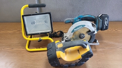 Makita Battery Powered Circular Saw, Working Energizer Hard Case Flashlight and Small Floor Shop Light