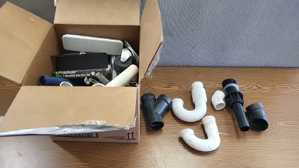 Box of Home Plumbing PVC Pipe and More