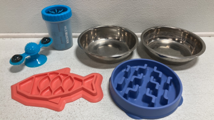 (2) Metal Dog Bowls, (1) Slow Feeder Dog Bowl, (1) Slow Feeder Cat Dish, (1) Spinning Cat Toy, (1) MudBuster Paw Cleaner