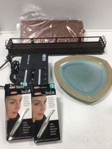 Shelf, Decorative Shelf, Plate, Tripp-Lite Surge Protector, (2) VersaTrim Facial Hair Remover.