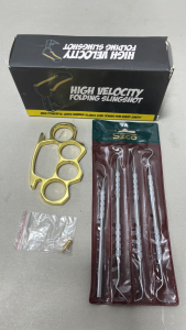(1) High Velocity Folding Slingshot, (1) Set Szco 4 Piece Dental Pick/Hobby Set, (1) Brass Toned Paperweight With Belt Conversion Attachment