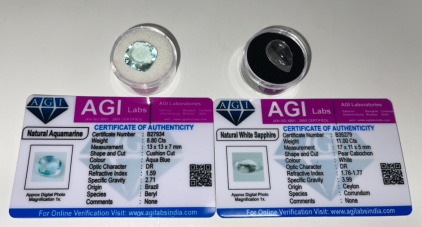 (2) Certified Natural Gemstones&hellip; (1) 8.80ct Natural Aquamarine , (1) 11.00ct Natural White Sapphire&hellip; Both With COA