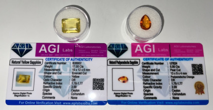 (2) Certified Natural Gemstones&hellip; (1) 17ct Natural Yellow Sapphire, (1) 5.95ct Natural Padparadscha Sapphire&hellip; Both With COA