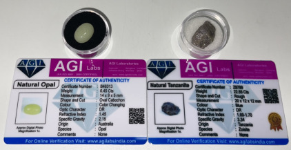 (2) Certified Natural Gemstones&hellip; (1) 6.45ct Color Changing Natural Opal, (1) 22.55ct Blue Rpugh Tanzanite Both With COA