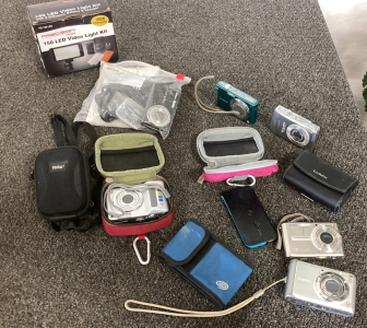 7 Digital Camera With 5 Cases 150 LED Video Light Kit Not Tested Please Inspect No Charge Cables