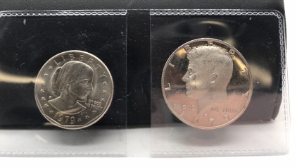 (2) 1979 Coins - (1) Liberty Half Dollar & Liberty Dollar Coin
