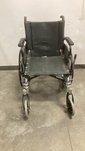 Invacare 9000XT Wheelchair With Foot Rest Extended Hand Brake On Left Side Inspect For Size