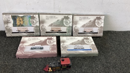 “N” Scale Train Cars In Boxes