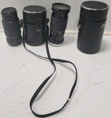 (2) Camera Lenses In Cases