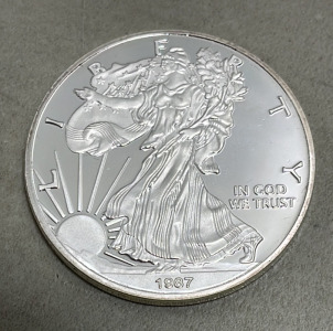 (1) 1987 1oz Fine Silver One Dollar Silver Eagle