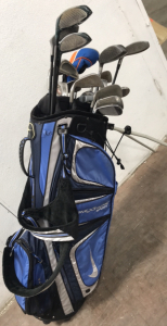 Assorted Golf Clubs and Nike Extreme Sports Golf Bag