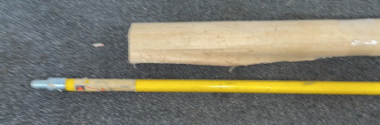 Roll Of Burlap Paper and Broomstick [A]