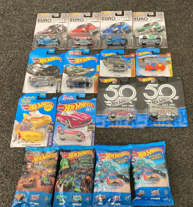 Factory Sealed Hot Wheels Cars. Includes: The Beatles Yellow Submarine, Barbie Stingray, Euro Style And More