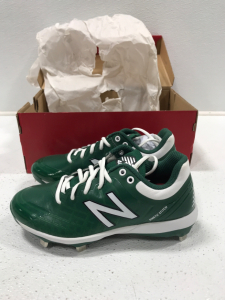 Size 5.5 New Balance Cleats. 7/8 Spenco High Arch Supports.