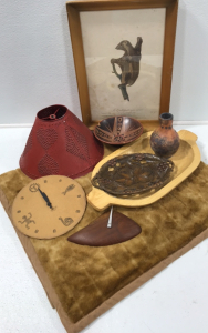 (1) Metal Lamp Shade (1) Wood Numberless Clock (1) Ceramic Vase (1) Wood Bowl (2) Trays (1) Umbra Wall Clock (1) Grandeur Naturelle Framed Print (1) Fur Throw Blanket