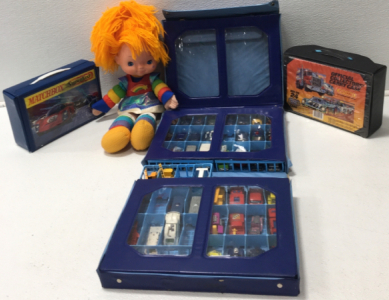 (2) Small Matchbox Cars Cases, (1) Large Matchbox Cars Case With Matchbox Cars, (1) Rainbow Brite Doll