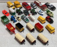 Assorted Toy Cars and Train Cars