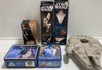 Millennium Falcon Toy, (2) Small Star Wars Lunch Boxes, (2) Star Wars Flying Model Kits, Original Star Wars Trilogy Special Edition VHS Set