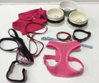 (3) Dog Bowls, (2) Leashes (3) Collars, (1) Harness, (1) Pink Dog Shirt