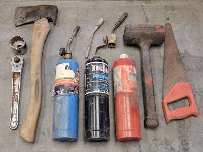 Ax, 1/2" Ratchet w/1-1/2" Socket, Rubber Mallet, Propane Tanks
