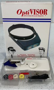 Singer* Handy Stitch Hand-Held Sewing Machine And OptiVisor* Optical Glass Binocular Magnifier