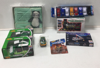 Hoist Toy, Jurassic Park Car, (2) Toy Trackers, Locomotive Toy, (7) Pk Racing Trucks, Baby Blanket Set
