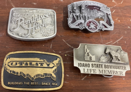 (1) Country&rsquo;Hitch Belt Buckle, (1) Budweiser Belt Buckle, (1) Utility Belt Buckle, (1) Idaho State Bowhunted Life Member Belt Buckle