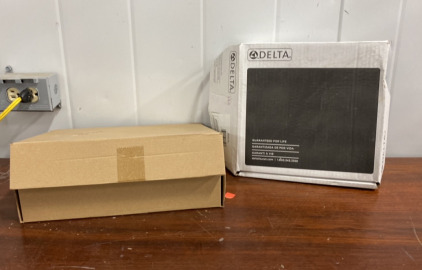 (1) Delta Faucet, (1) Unbranded Faucet
