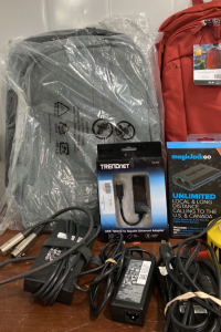 (2) Grey Lonovo Laptop Cases, (1) Red Case Logic Backpack, (1) Trendnet USB Type-C Gigabit Ethernet Adapter, (1) Magic Jack GO Unlimited Local and Long Distance Calling to The U.S and Canada, and more