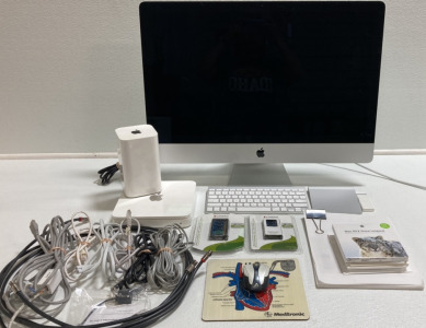 Apple iMac w/ Keyboard and Trackpad, (2) Apple Time Capsules, (2) Kingston 2GB Memory Boards, Manuals and Assorted Cord/Cables