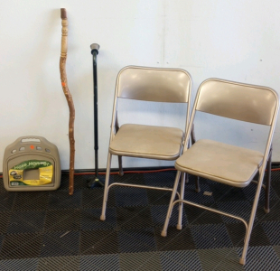 (2) Metal Folding Chairs (1) Hugo Brand Cane (1) Hand Carved Wood Walking Stick (1) Ames 150' Hose Capacity Hose Hanger