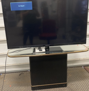 (1) Proscan 55&rdquo; Wide Screen Digital LED TV, (1) Black and Gold TV Stand