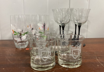 (4) Bug and Flower Print Glass Cups, (4) Black and Clear Wine Glassss, (4) Small Clear Chamberlin Cups