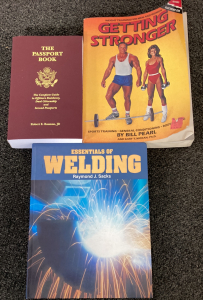 Welding, Passport And Weight Training Books